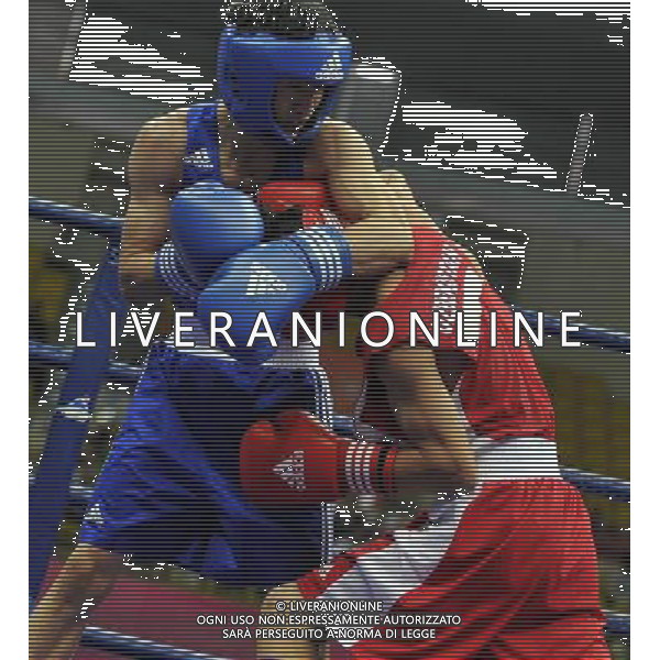 (101120) -- FOSHAN, Nov. 20, 2010 () -- Zou Shiming (L) of China competes during the men\'s 46-49 kg match of boxing competition against Jasurbek Latipov of Uzbekistan at the 16th Asian Games in Guangzhou, south China\'s Guangdong Province, Nov. 20, 2010. Zou Shiming won 9-2. (/Gong Lei) ©photoshot/Agenzia Aldo Liverani Sas - ITALY ONLY - CINA: 16mi Giochi Asiatici