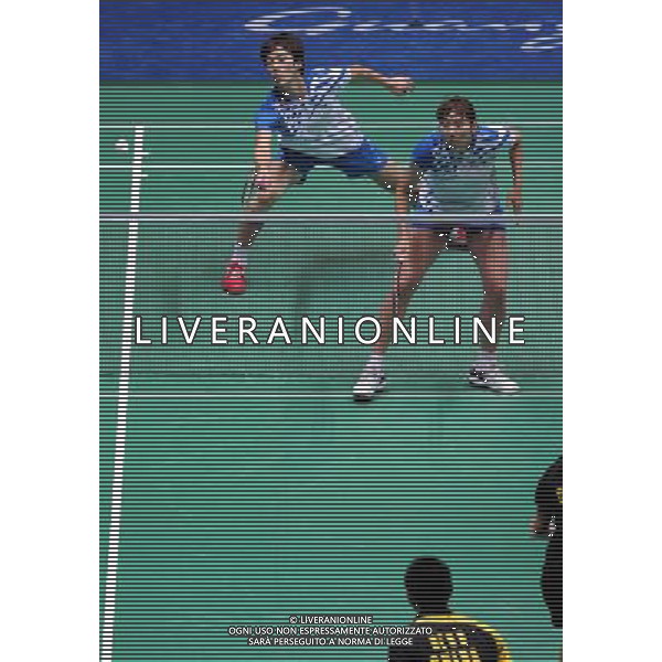 (101120) -- GUANGZHOU, Nov. 20, 2010 () -- Shin Baek Cheol (above L) and Lee Hyo Jung of South Korea compete during the mixed doubles semifinal of badminton competition against He Hanbin and Ma Jin of China at the 16th Asian Games in Guangzhou, south China\'s Guangdong Province, Nov. 20, 2010. Shin Baek Cheol and Lee Hyo Jung won 2-1 to enter the final. (/Song Zhenping) ©photoshot/Agenzia Aldo Liverani Sas - ITALY ONLY - CINA: 16mi Giochi Asiatici