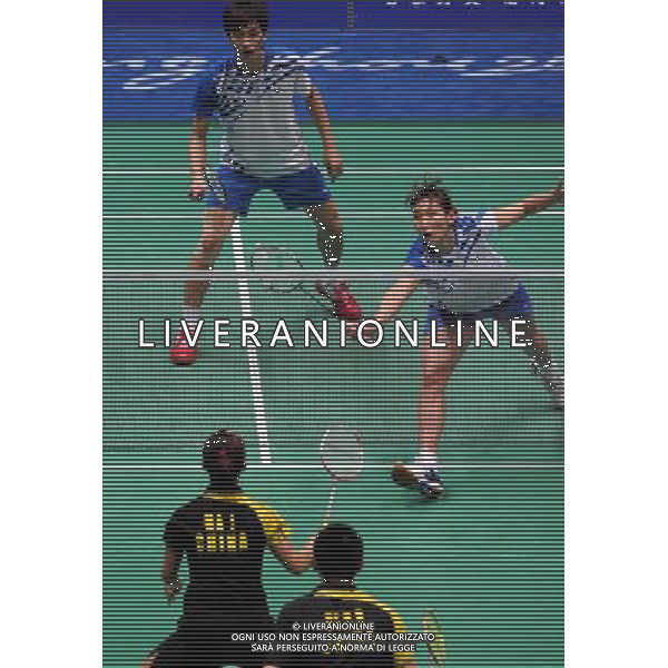 (101120) -- GUANGZHOU, Nov. 20, 2010 () -- Shin Baek Cheol (above L) and Lee Hyo Jung of South Korea compete during the mixed doubles semifinal of badminton competition against He Hanbin and Ma Jin of China at the 16th Asian Games in Guangzhou, south China\'s Guangdong Province, Nov. 20, 2010. Shin Baek Cheol and Lee Hyojung won 2-1 to enter the final. (/Song Zhenping) ©photoshot/Agenzia Aldo Liverani Sas - ITALY ONLY - CINA: 16mi Giochi Asiatici