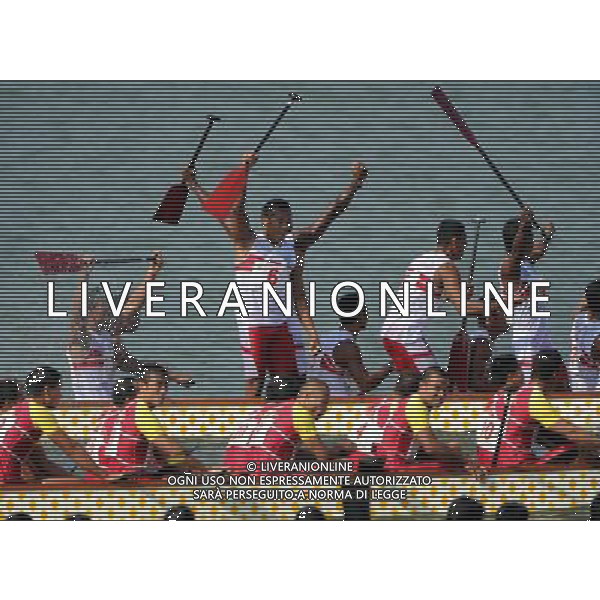 (101120) -- GUANGZHOU, Nov. 20, 2010 () -- Indonesian rowers celebrate their victory in the men\'s 250m straight race grand final of dragon boat at the 16th Asian Games in Guangzhou, south China\'s Guangdong Province, Nov. 20, 2010. Indonesia claimed the title in 48.681 seconds. (/Guo Yong) ©photoshot/Agenzia Aldo Liverani Sas - ITALY ONLY - CINA: 16mi Giochi Asiatici