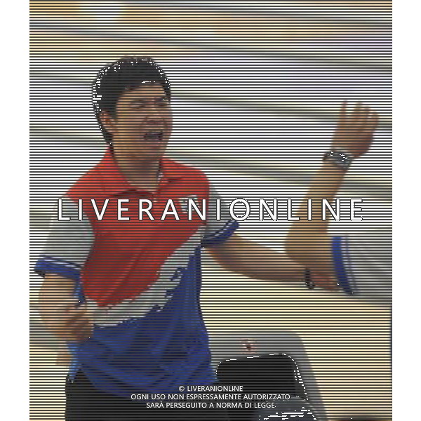 (101120) -- GUANGZHOU, Nov. 20 () -- Choi Yong Kyu of South Korea celebrates with his teammates during men\'s trios final of bowling event at the 16th Asian Games in Guangzhou, south China\'s Guangdong Province, Nov. 20, 2010. South Korea\'s Choi Bok Eum/Choi Yong Kyu/Jang Dong Chul won the gold medal with a total of 4061 points. (/Li Gang)(rzl) ©photoshot/Agenzia Aldo Liverani Sas - ITALY ONLY - CINA: 16mi Giochi Asiatici