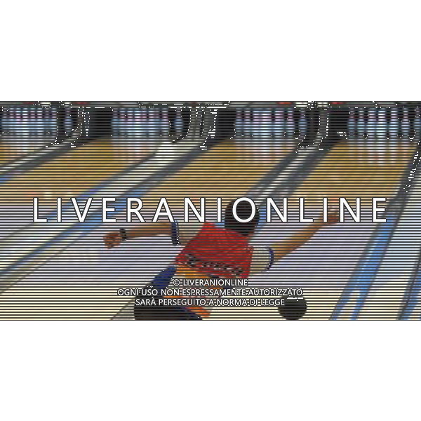 (101120) -- GUANGZHOU, Nov. 20 () -- Jang Dong Chul of South Korea competes during men\'s trios final of bowling event at the 16th Asian Games in Guangzhou, south China\'s Guangdong Province, Nov. 20, 2010. South Korea\'s Choi Bok Eum/Choi Yong Kyu/Jang Dong Chul won the gold medal with a total of 4061 points. (/Li Gang)(rzl) ©photoshot/Agenzia Aldo Liverani Sas - ITALY ONLY - CINA: 16mi Giochi Asiatici