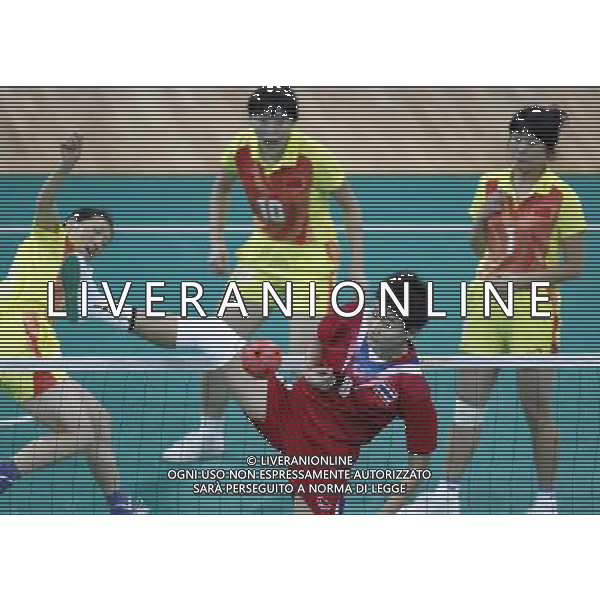 (101120) -- GUANGZHOU, Nov. 20, 2010 () -- Thailand\'s Tidawan Daosakul (in red) attacks during the women\'s team final of Sepaktakraw against China at the 16th Asian Games in Guangzhou, south China\'s Guangdong Province, Nov. 20, 2010. Thailand won by 2-0 and claimed the title of the event. (/Ren Zhenglai) ©photoshot/Agenzia Aldo Liverani Sas - ITALY ONLY - CINA: 16mi Giochi Asiatici