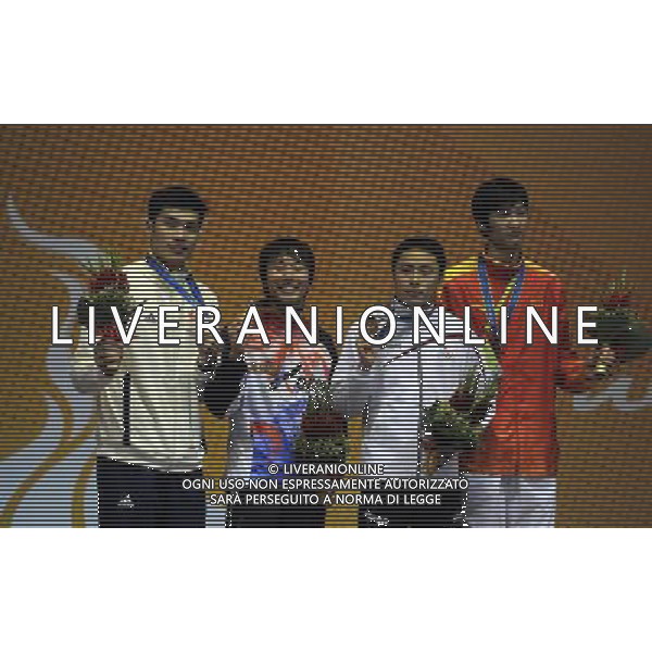 (101120) -- GUANGZHOU, Nov. 20, 2010 () -- Gold medalist South Korea\'s Choi Byung Chul (2nd L), silver medalist Cheung Siu Lun of Hong Kong of China (L), bronze medalists China\'s Lei Sheng (R) and Japan\'s Yuki Ota pose for photos during the awarding ceremony of the men\'s individual foil of fencing at the 16th Asian Games in Guangzhou, south China\'s Guangdong Province, Nov. 20, 2010. (/Yang Lei) ©photoshot/Agenzia Aldo Liverani Sas - ITALY ONLY - CINA: 16mi Giochi Asiatici