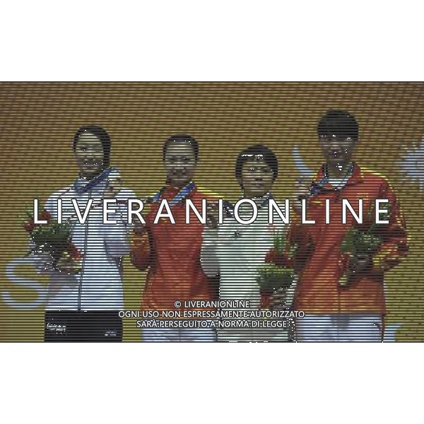(101120) -- GUANGZHOU, Nov. 20, 2010 () -- Gold medalist China\'s Luo Xiaojuan (2nd L), silver medalist Japan\'s Nozomi Nakano (L), bronze medalist China\'s Xu Anqi (R) and Yeung Chui Ling of Hong Kong of China pose for photos during the awarding ceremony of women\'s individual epee of fencing at the 16th Asian Games in Guangzhou, south China\'s Guangdong Province, Nov. 20, 2010. (/Yang Lei) ©photoshot/Agenzia Aldo Liverani Sas - ITALY ONLY - CINA: 16mi Giochi Asiatici
