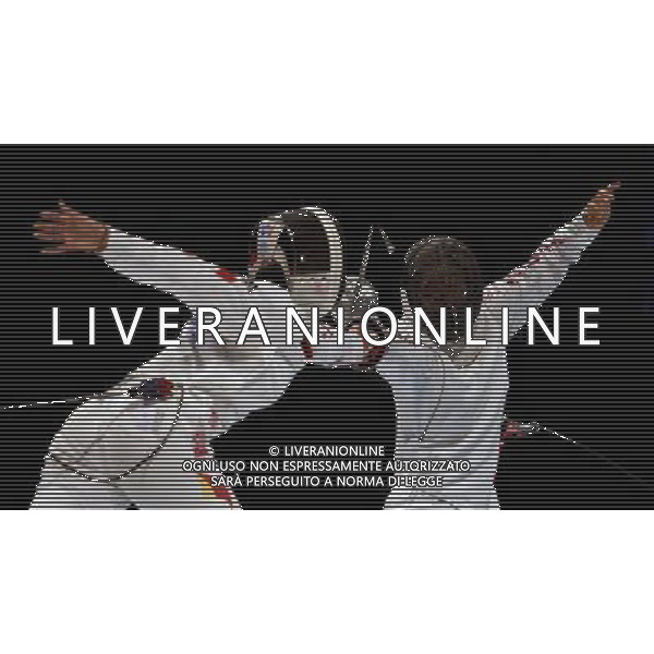 (101120) -- GUANGZHOU, Nov. 20, 2010 () -- China\'s Luo Xiaojuan (L) competes with Japan\'s Nozomi Nakano during their women\'s individual epee final of fencing at the 16th Asian Games in Guangzhou, south China\'s Guangdong Province, Nov. 20, 2010. Luo Xiaojuan won the match 13-10 to claim the title of the event. (/Chen Xiaowei) ©photoshot/Agenzia Aldo Liverani Sas - ITALY ONLY - CINA: 16mi Giochi Asiatici