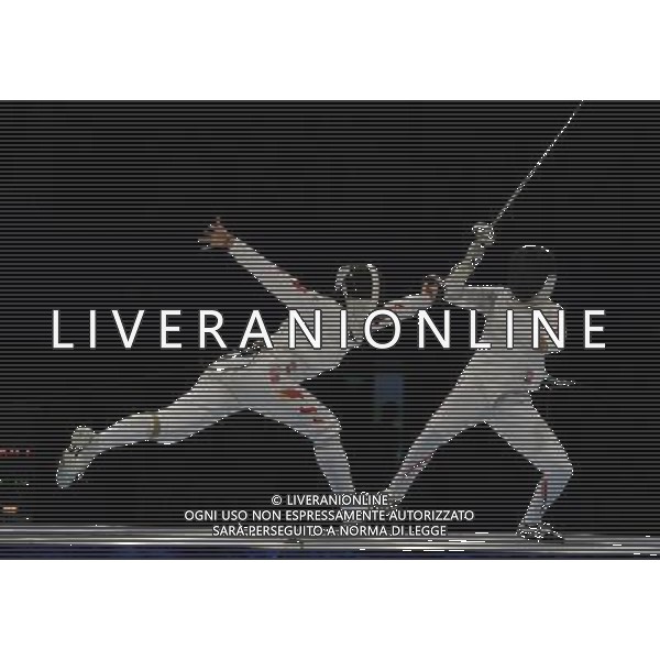 (101120) -- GUANGZHOU, Nov. 20, 2010 () -- China\'s Luo Xiaojuan (L) competes with Japan\'s Nozomi Nakano during their women\'s individual epee final of fencing at the 16th Asian Games in Guangzhou, south China\'s Guangdong Province, Nov. 20, 2010. Luo Xiaojuan won the match 13-10 to claim the title of the event. (/Yang Lei) ©photoshot/Agenzia Aldo Liverani Sas - ITALY ONLY - CINA: 16mi Giochi Asiatici