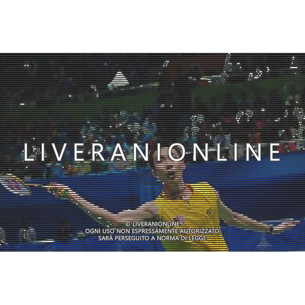 (101120) -- GUANGZHOU, Nov. 20, 2010 () -- Lee Chong Wei of Malaysia returns the shuttle during the semifinal of men\'s singles of badminton against Chen Jin of China at the 16th Asian Games in Guangzhou, south China\'s Guangdong Province, Nov. 20, 2010. Lee won 2-1. (/Lu Hanxin)(wll) ©photoshot/Agenzia Aldo Liverani Sas - ITALY ONLY - CINA: 16mi Giochi Asiatici