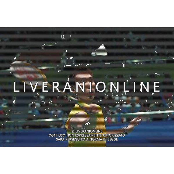 (101120) -- GUANGZHOU, Nov. 20, 2010 () -- Lee Chong Wei of Malaysia returns the shuttle during the semifinal of men\'s singles of badminton against Chen Jin of China at the 16th Asian Games in Guangzhou, south China\'s Guangdong Province, Nov. 20, 2010. Lee won 2-1. (/Lu Hanxin)(wll) ©photoshot/Agenzia Aldo Liverani Sas - ITALY ONLY - CINA: 16mi Giochi Asiatici