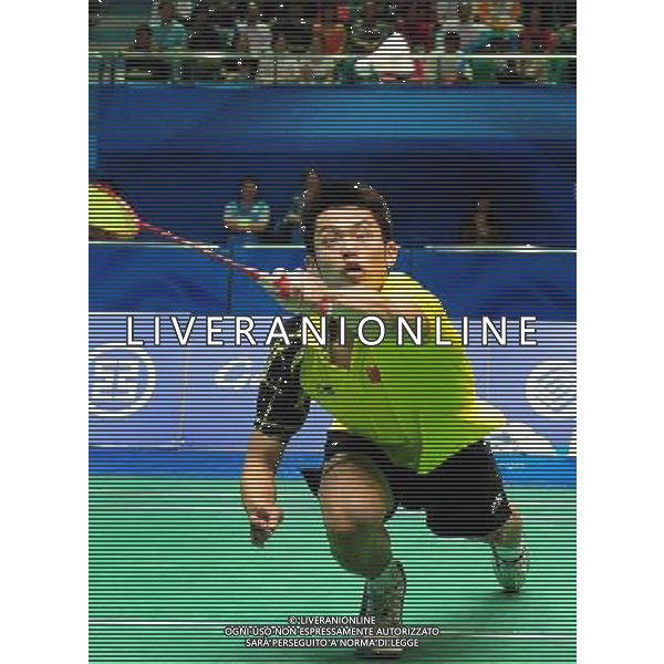 (101120) -- GUANGZHOU, Nov. 20, 2010 () -- Lin Dan of China returns the shuttlecock during the semifinal of men\'s singles of badminton against Park Sunghwan of South Korea at the 16th Asian Games in Guangzhou, south China\'s Guangdong Province, Nov. 20, 2010. Lin won 2-0. (/Lu Hanxin)(wll) ©photoshot/Agenzia Aldo Liverani Sas - ITALY ONLY - CINA: 16mi Giochi Asiatici