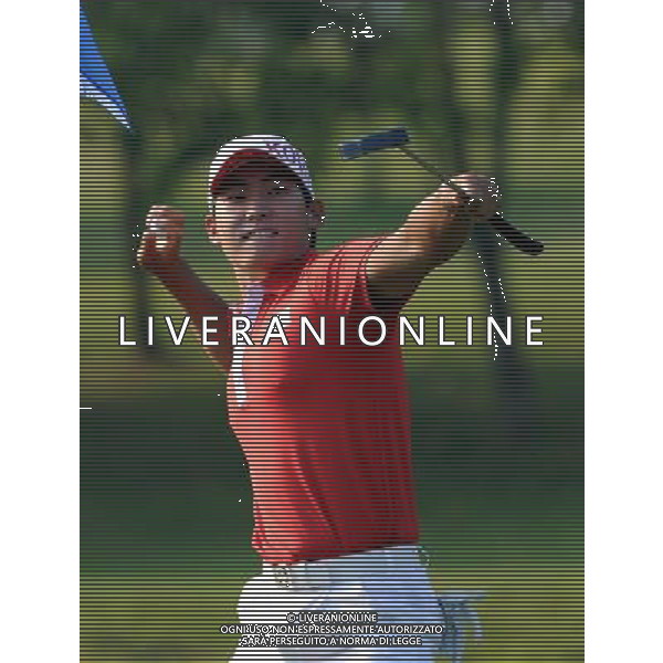 (101120) -- GUANGZHOU, Nov. 20, 2010 () -- Kim Meen Whee of South Korea reacts during the men\'s individual of golf competition at the 16th Asian Games in Guangzhou, south China\'s Guangdong Province, Nov. 20, 2010. Kim Meen Whee won the gold of the event with 273 pars. (/Yang Shiyao) ©photoshot/Agenzia Aldo Liverani Sas - ITALY ONLY - CINA: 16mi Giochi Asiatici