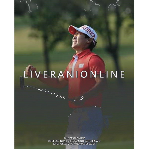 (101120) -- GUANGZHOU, Nov. 20, 2010 () -- Kim Meen Whee of South Korea reacts during the men\'s individual of golf competition at the 16th Asian Games in Guangzhou, south China\'s Guangdong Province, Nov. 20, 2010. Kim Meen Whee won the gold of the event with 273 pars. (/Yang Shiyao) ©photoshot/Agenzia Aldo Liverani Sas - ITALY ONLY - CINA: 16mi Giochi Asiatici