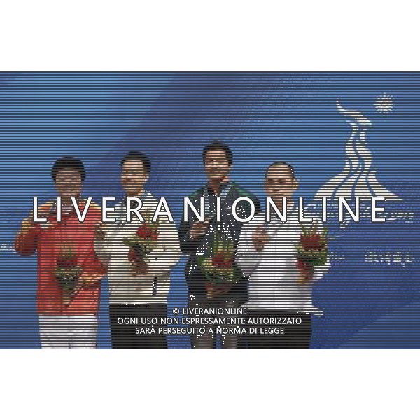 (101120) -- GUANGZHOU, Nov. 20, 2010 () -- Gold medalist Fu Ka Chun Marco (2nd L) of Hong Kong of China, silver medalist Ding Junhui (L) of China, bronze medalist Aditya Snehal Mehta (2nd R) of India and Dechawat Poomjaeng of Thailand pose during the awarding ceremony for the men\'s snooker singles at the 16th Asian Games in Guangzhou, south China\'s Guangdong Province, Nov. 20, 2010. (/Jiang Kehong) ©photoshot/Agenzia Aldo Liverani Sas - ITALY ONLY - CINA: 16mi Giochi Asiatici