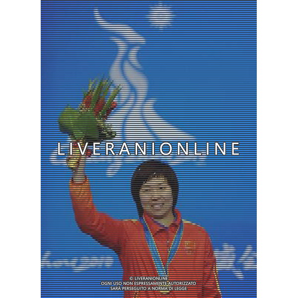 (101120) -- GUANGZHOU, Nov. 20, 2010 () -- Gold medalist Li Xiaoxia of China stands on the podium of the women\'s singles awarding ceremony of table tennis competition at the 16th Asian Games in Guangzhou, south China\'s Guangdong Province, Nov. 20, 2010. (/Xu Jiajun) ©photoshot/Agenzia Aldo Liverani Sas - ITALY ONLY - CINA: 16mi Giochi Asiatici
