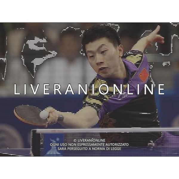 (101120) -- GUANGZHOU, Nov. 20, 2010 () -- Ma Long of China competes during the men\'s singles final of table tennis competition against his compatriot Wang Hao at the 16th Asian Games in Guangzhou, south China\'s Guangdong Province, Nov. 20, 2010. Ma Long defeated Wang 4-2 and won the gold of the event. (/Fan Jun) ©photoshot/Agenzia Aldo Liverani Sas - ITALY ONLY - CINA: 16mi Giochi Asiatici