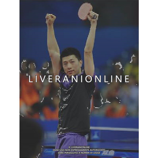 (101120) -- GUANGZHOU, Nov. 20, 2010 () -- Ma Long of China reacts during the men\'s singles final of table tennis competition against his compatriot Wang Hao at the 16th Asian Games in Guangzhou, south China\'s Guangdong Province, Nov. 20, 2010. Ma Long defeated Wang 4-2 and won the gold of the event. (/Xu Jiajun) ©photoshot/Agenzia Aldo Liverani Sas - ITALY ONLY - CINA: 16mi Giochi Asiatici