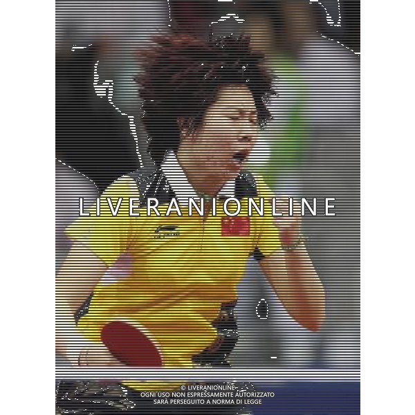 (101120) -- GUANGZHOU, Nov. 20, 2010 () -- Li Xiaoxia of China competes during the women\'s singles final of table tennis competition against Guo Yue of China at the 16th Asian Games in Guangzhou, south China\'s Guangdong Province, Nov. 20, 2010. Li Xiaoxia won 4-3 to get the gold medal. (/Fan Jun) ©photoshot/Agenzia Aldo Liverani Sas - ITALY ONLY - CINA: 16mi Giochi Asiatici