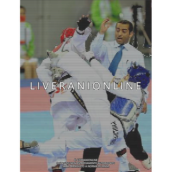 (101120) -- GUANGZHOU, Nov. 20, 2010 () -- Paul Romero(R) of Philippines fights against Wei Chen Yang of Chinese Taipei during the semifinal of men\'s under 58kg of taekwondo at the 16th Asian Games in Guangzhou, south China\'s Guangdong Province, Nov. 20, 2010. Paul lost the match and took the bronze. (/Chen Kai)(wll) ©photoshot/Agenzia Aldo Liverani Sas - ITALY ONLY - CINA: 16mi Giochi Asiatici