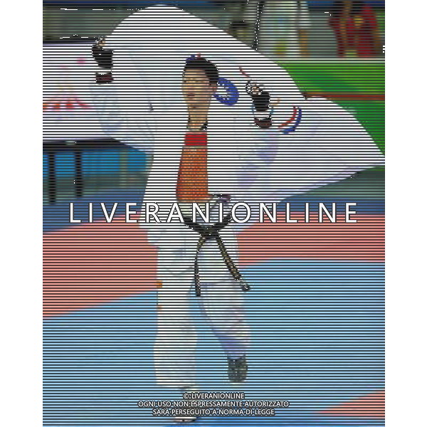 (101120) -- GUANGZHOU, Nov. 20, 2010 () -- Wei Chen Yang of Chinese Taipei celebrates after the final of men\'s under 58kg of taekwondo against Pen-Ek Karaket of Thailand at the 16th Asian Games in Guangzhou, south China\'s Guangdong Province, Nov. 20, 2010. Wei claimed the title. (/Chen Kai)(wll) ©photoshot/Agenzia Aldo Liverani Sas - ITALY ONLY - CINA: 16mi Giochi Asiatici