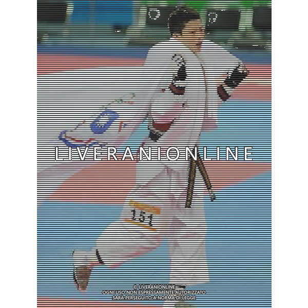 (101120) -- GUANGZHOU, Nov. 20, 2010 () -- Wei Chen Yang of Chinese Taipei celebrates after the final of men\'s under 58kg of taekwondo against Pen-Ek Karaket of Thailand at the 16th Asian Games in Guangzhou, south China\'s Guangdong Province, Nov. 20, 2010. Wei claimed the title. (/Chen Kai)(wll) ©photoshot/Agenzia Aldo Liverani Sas - ITALY ONLY - CINA: 16mi Giochi Asiatici