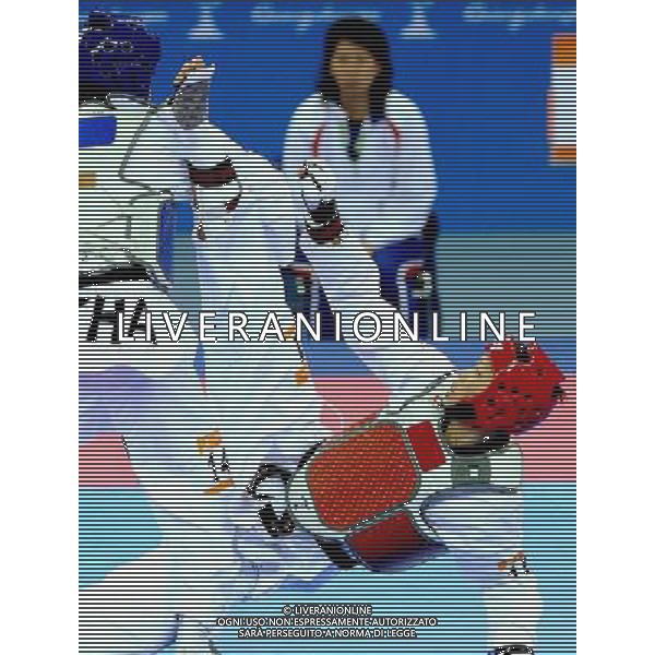 (101120) -- GUANGZHOU, Nov. 20, 2010 () -- Wei Chen Yang (R) of Chinese Taipei fights against Pen-Ek Karaket of Thailand during the final of men\'s under 58kg of taekwondo at the 16th Asian Games in Guangzhou, south China\'s Guangdong Province, Nov. 20, 2010. Wei claimed the title. (/Chen Kai)(wll) ©photoshot/Agenzia Aldo Liverani Sas - ITALY ONLY - CINA: 16mi Giochi Asiatici