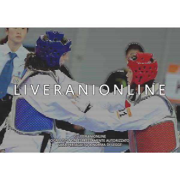(101120) -- GUANGZHOU, Nov. 20, 2010 () -- Nadin Dawani(L) of Jordan fights with Oh Jung Ah of South Korea during their semifinal of women\'s over 73kg of taekwondo at the 16th Asian Games in Guangzhou, south China\'s Guangdong Province, Nov. 20, 2010. Dawani lost the match and took the bronze. (/Chen Kai)(wll) ©photoshot/Agenzia Aldo Liverani Sas - ITALY ONLY - CINA: 16mi Giochi Asiatici