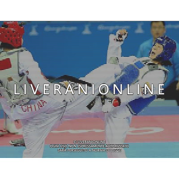 (101120) -- GUANGZHOU, Nov. 20, 2010 () -- Oh Jung Ah(R) of South Korea fights with Liu Rui of China during their final of women\'s over 73kg of taekwondo at the 16th Asian Games in Guangzhou, south China\'s Guangdong Province, Nov. 20, 2010. Liu claimed the title with 4-3. (/Chen Kai)(wll) ©photoshot/Agenzia Aldo Liverani Sas - ITALY ONLY - CINA: 16mi Giochi Asiatici