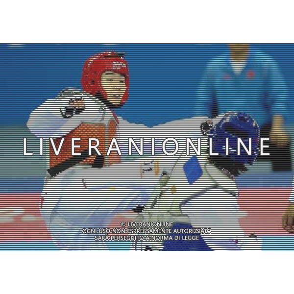 (101120) -- GUANGZHOU, Nov. 20, 2010 () -- Liu Rui (L) of China fights with Oh Jung Ah of South Korea during their final of women\'s over 73kg of taekwondo at the 16th Asian Games in Guangzhou, south China\'s Guangdong Province, Nov. 20, 2010. Liu claimed the title with 4-3. (/Chen Kai)(wll) ©photoshot/Agenzia Aldo Liverani Sas - ITALY ONLY - CINA: 16mi Giochi Asiatici