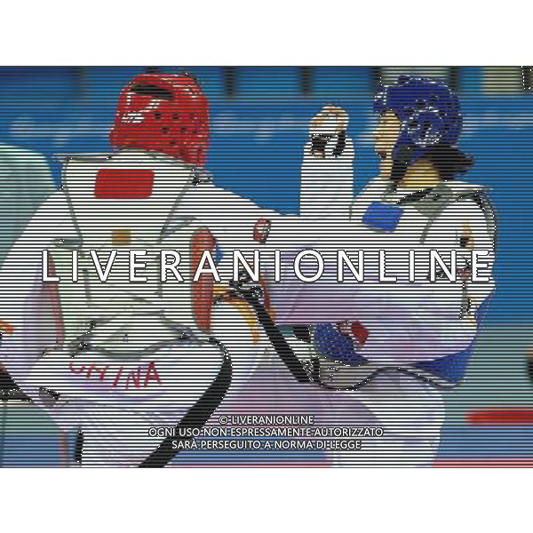 (101120) -- GUANGZHOU, Nov. 20, 2010 () -- Oh Jung Ah(R) of South Korea fights with Liu Rui of China during their final of women\'s over 73kg of taekwondo at the 16th Asian Games in Guangzhou, south China\'s Guangdong Province, Nov. 20, 2010. Liu claimed the title with 4-3. (/Chen Kai)(wll) ©photoshot/Agenzia Aldo Liverani Sas - ITALY ONLY - CINA: 16mi Giochi Asiatici