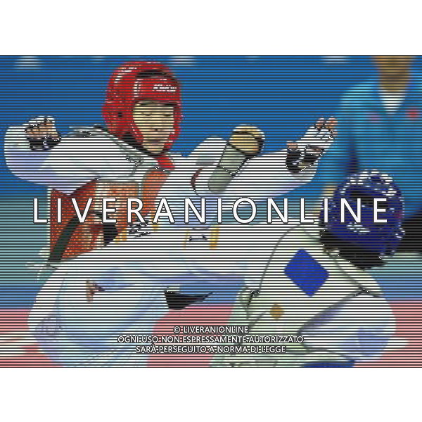 (101120) -- GUANGZHOU, Nov. 20, 2010 () -- Liu Rui (L) of China fights with Oh Jung Ah of South Korea during their final of women\'s over 73kg of taekwondo at the 16th Asian Games in Guangzhou, south China\'s Guangdong Province, Nov. 20, 2010. Liu claimed the title with 4-3. (/Chen Kai)(wll) ©photoshot/Agenzia Aldo Liverani Sas - ITALY ONLY - CINA: 16mi Giochi Asiatici