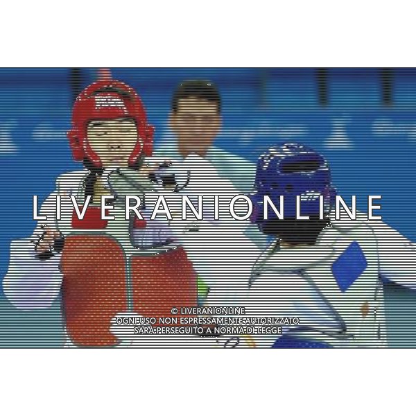 (101120) -- GUANGZHOU, Nov. 20, 2010 () -- Liu Rui (L) of China fights with Oh Jung Ah of South Korea during their final of women\'s over 73kg of taekwondo at the 16th Asian Games in Guangzhou, south China\'s Guangdong Province, Nov. 20, 2010. Liu claimed the title with 4-3. (/Chen Kai)(wll) ©photoshot/Agenzia Aldo Liverani Sas - ITALY ONLY - CINA: 16mi Giochi Asiatici