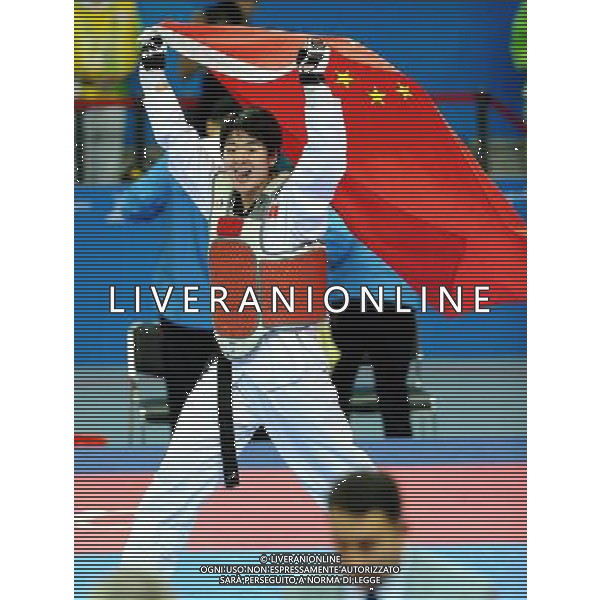 (101120) -- GUANGZHOU, Nov. 20, 2010 () -- Liu Rui of China celebrates after winning the final of women\'s over 73kg of taekwondo against Oh Jung Ah of South Korea at the 16th Asian Games in Guangzhou, south China\'s Guangdong Province, Nov. 20, 2010. Liu claimed the title with 4-3. (/Chen Kai)(wll) ©photoshot/Agenzia Aldo Liverani Sas - ITALY ONLY - CINA: 16mi Giochi Asiatici