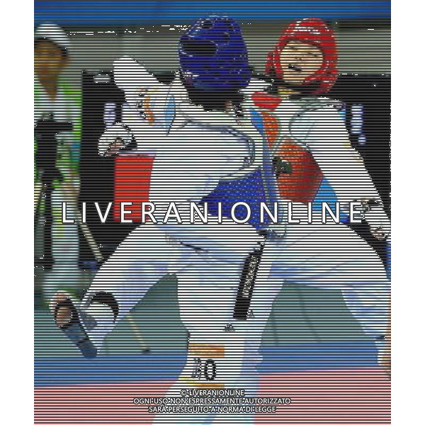 (101120) -- GUANGZHOU, Nov. 20, 2010 () -- Kirstie Elaine Alora(R) of Philippines fights with Feruza Yergeshova of Kazakhstan during their semifinal of women\'s under 73kg of taekwondo at the 16th Asian Games in Guangzhou, south China\'s Guangdong Province, Nov. 20, 2010. Alora lost the match and took the bronze. (/Chen Kai)(wll) ©photoshot/Agenzia Aldo Liverani Sas - ITALY ONLY - CINA: 16mi Giochi Asiatici