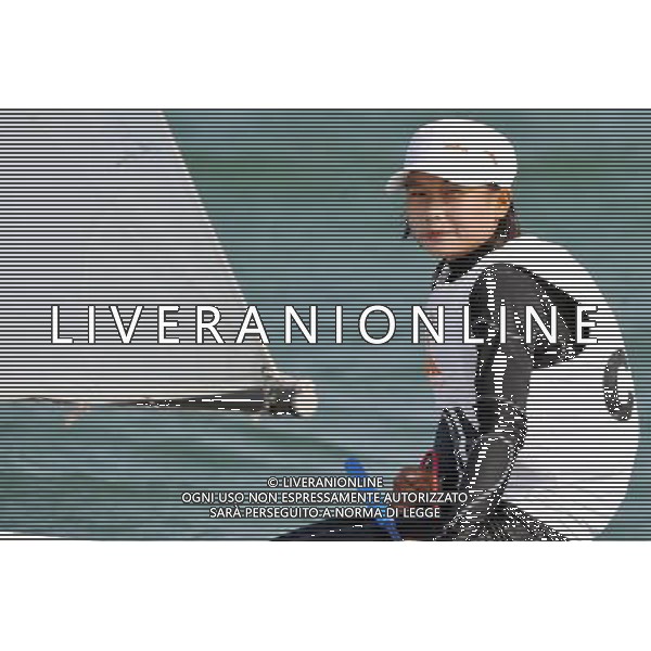 (101120) -- SHANWEI, Nov. 20, 2010 () -- China\'s Lu Yuting competes during the women\'s Dinghy Optimist race of sailing competition at the 16th Asian Games in Shanwei, south China\'s Guangdong Province, Nov. 20, 2010. China\'s Lu Yuting won the bronze. (/Zhu Zheng) ©photoshot/Agenzia Aldo Liverani Sas - ITALY ONLY - CINA: 16mi Giochi Asiatici