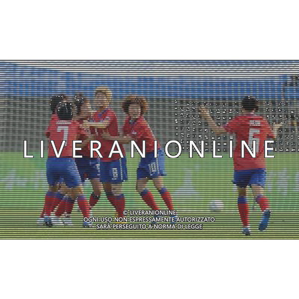 (101121) -- GUANGZHOU, Nov. 21, 2010 () -- Players of South Korea celebrate scoring during the Women\'s Bronze Medal Match of Soccer against China at the 16th Asian Games in Guangzhou, south China\'s Guangdong Province, Nov. 21, 2010. (/Guo Yong)(wll) ©photoshot/Agenzia Aldo Liverani Sas - ITALY ONLY - CINA: 16mi Giochi Asiatici