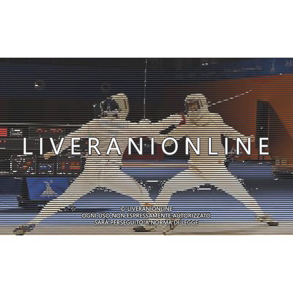 (101122) -- GUANGZHOU, Nov. 22, 2010 () -- China\'s Liu Xiao(R) competes with Japan\'s Yamamoto Koji during their men\'s team sabre semifinal match of Fencing at the 16th Asian Games in Guangzhou, south China\'s Guangdong Province, Nov. 22, 2010. China won 45-19 to enter the final match. (/Chen Yehua) ©photoshot/Agenzia Aldo Liverani Sas - ITALY ONLY - CINA: 16mi Giochi Asiatici