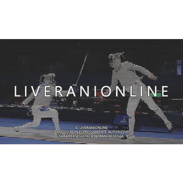 (101122) -- GUANGZHOU, Nov. 22, 2010 () -- Gu Bon Gil(R) of South Korea competes with Turlybekov Z of Kazakhstan during their men\'s team sabre semifinal match of Fencing at the 16th Asian Games in Guangzhou, south China\'s Guangdong Province, Nov. 22, 2010. South Korea won 45-33 to enter the final match. (/Yang Lei) ©photoshot/Agenzia Aldo Liverani Sas - ITALY ONLY - CINA: 16mi Giochi Asiatici