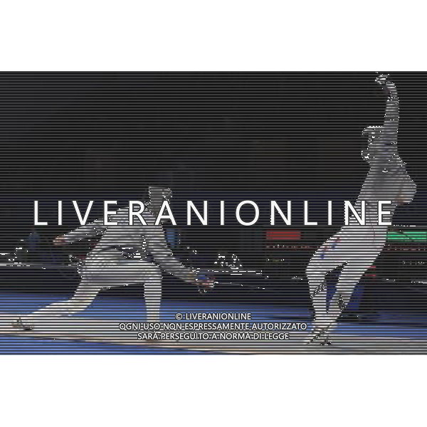(101122) -- GUANGZHOU, Nov. 22, 2010 () -- Oh Eun Seok(R) of South Korea competes with Yerali Tilenshiyev of Kazakhstan during their men\'s team sabre semifinal match of Fencing at the 16th Asian Games in Guangzhou, south China\'s Guangdong Province, Nov. 22, 2010. South Korea won 45-33 to enter the final match. (/Yang Lei) ©photoshot/Agenzia Aldo Liverani Sas - ITALY ONLY - CINA: 16mi Giochi Asiatici