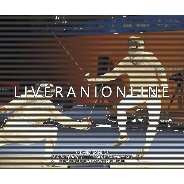 (101122) -- GUANGZHOU, Nov. 22, 2010 () -- China\'s Liu Xiao(R) competes with Japan\'s Kudo Shinya during their men\'s team sabre semifinal match of Fencing at the 16th Asian Games in Guangzhou, south China\'s Guangdong Province, Nov. 22, 2010. China won 45-19 to enter the final match. (/Chen Yehua) ©photoshot/Agenzia Aldo Liverani Sas - ITALY ONLY - CINA: 16mi Giochi Asiatici