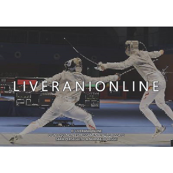 (101122) -- GUANGZHOU, Nov. 22, 2010 () -- China\'s Wang Jingzhi(R) competes with Japan\'s Kudo Shinya during their men\'s team sabre semifinal match of Fencing at the 16th Asian Games in Guangzhou, south China\'s Guangdong Province, Nov. 22, 2010. China won 45-19 to enter the final match. (/Chen Yehua) ©photoshot/Agenzia Aldo Liverani Sas - ITALY ONLY - CINA: 16mi Giochi Asiatici