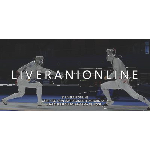 (101122) -- GUANGZHOU, Nov. 22, 2010 () -- Won Woo Young(R) of South Korea competes with Yevgeniy Frolov of Kazakhstan during their men\'s team sabre semifinal match of Fencing at the 16th Asian Games in Guangzhou, south China\'s Guangdong Province, Nov. 22, 2010. South Korea won 45-33 to enter the final match. (/Yang Lei) ©photoshot/Agenzia Aldo Liverani Sas - ITALY ONLY - CINA: 16mi Giochi Asiatici