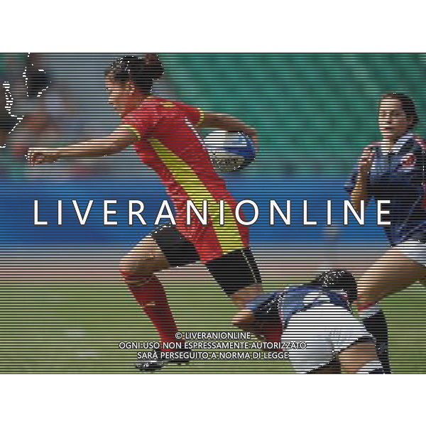 (101121) -- GUANGZHOU, Nov. 21, 2010 () -- Bai Ying (L) of China vies with a player from Hong Kong of China during their Women\'s Preliminary Round Pool A Match of Rugby at the 16th Asian Games in Guangzhou, south China\'s Guangdong Province, Nov. 21, 2010. China won 29-0. (/Chen Kai)(wll) ©photoshot/Agenzia Aldo Liverani Sas - ITALY ONLY - CINA: 16mi Giochi Asiatici