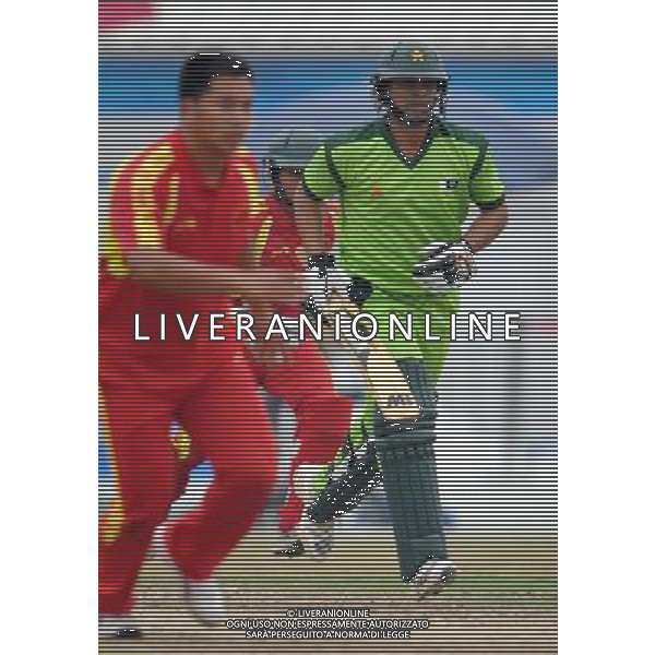 (101122) -- GUANGZHOU, Nov. 22, 2010 () -- Pakistan\'s Khalid Latif (R) runs during the men\'s quarterfinal of cricket against China at the 16th Asian Games in Guangzhou, south China\'s Guangdong Province, Nov. 22, 2010. Pakistan won the match 183-55 and entered the semifinal of the event. (/Liu Dawei) ©photoshot/Agenzia Aldo Liverani Sas - ITALY ONLY - CINA: 16mi Giochi Asiatici