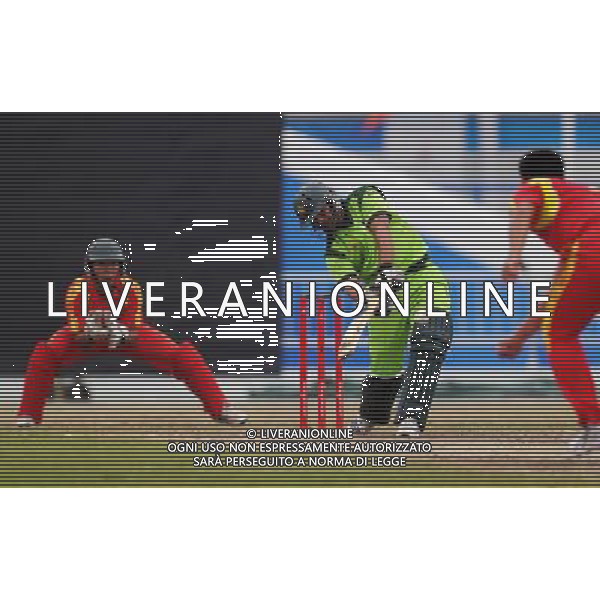 (101122) -- GUANGZHOU, Nov. 22, 2010 () -- Pakistan\'s Khalid Latif (C) hits the ball during the men\'s quarterfinal of cricket against China at the 16th Asian Games in Guangzhou, south China\'s Guangdong Province, Nov. 22, 2010. Pakistan won the match 183-55 and entered the semifinal of the event. (/Wang Ye) ©photoshot/Agenzia Aldo Liverani Sas - ITALY ONLY - CINA: 16mi Giochi Asiatici