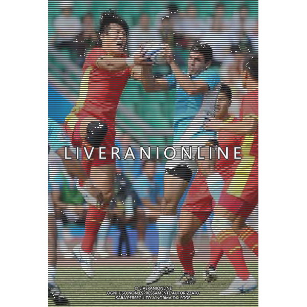 (101121) -- GUANGZHOU, Nov. 21, 2010 () -- He Zhongliang (L) of China vies with a player of India during their Men\'s Preliminary Round Pool B Match of Rugby at the 16th Asian Games in Guangzhou, south China\'s Guangdong Province, Nov. 21, 2010. China won 61-0. (/Chen Kai)(wll) ©photoshot/Agenzia Aldo Liverani Sas - ITALY ONLY - CINA: 16mi Giochi Asiatici