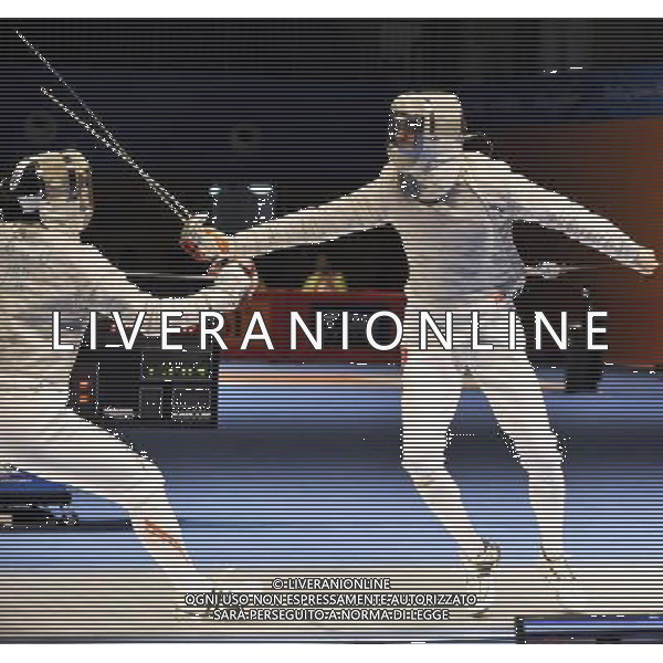 (101122) -- GUANGZHOU, Nov. 22, 2010 () -- China\'s Zhong Man (R) competes against Japan\'s Kudo Shinya during men\'s team sabre semifinals match of fencing at the 16th Asian Games in Guanghzou, south China\'s Guangdong Province, Nov. 22, 2010. China beat Japan 45-19. (/Chen Yehua) ©photoshot/Agenzia Aldo Liverani Sas - ITALY ONLY - CINA: 16mi Giochi Asiatici