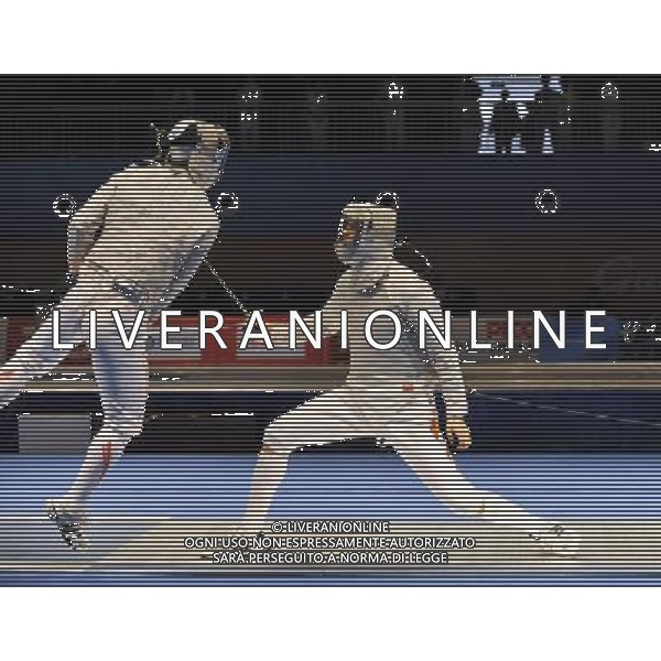 (101122) -- GUANGZHOU, Nov. 22, 2010 () -- China\'s Zhong Man (R) competes against Japan\'s Kudo Shinya during men\'s team sabre semifinals match of fencing at the 16th Asian Games in Guanghzou, south China\'s Guangdong Province, Nov. 22, 2010. China beat Japan 45-19. (/Chen Yehua) ©photoshot/Agenzia Aldo Liverani Sas - ITALY ONLY - CINA: 16mi Giochi Asiatici