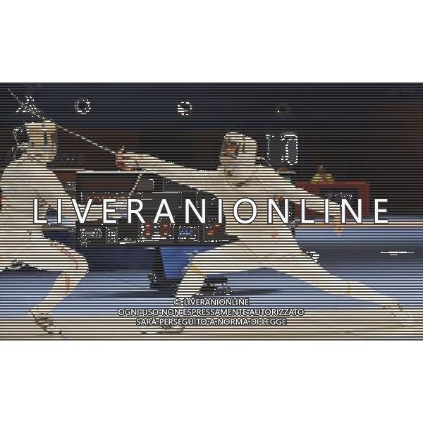 (101122) -- GUANGZHOU, Nov. 22, 2010 () -- China\'s Zhong Man (R) competes against Japan\'s Yamamoto Koji during men\'s team sabre semifinals match of fencing at the 16th Asian Games in Guanghzou, south China\'s Guangdong Province, Nov. 22, 2010. China beat Japan 45-19. (/Chen Yehua) ©photoshot/Agenzia Aldo Liverani Sas - ITALY ONLY - CINA: 16mi Giochi Asiatici