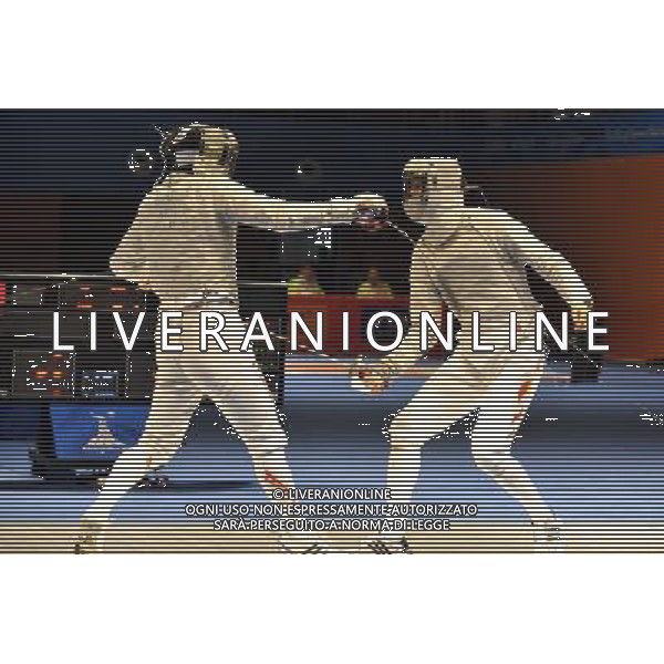 (101122) -- GUANGZHOU, Nov. 22, 2010 () -- China\'s Zhong Man (R) competes against Japan\'s Kudo Shinya during men\'s team sabre semifinals match of fencing at the 16th Asian Games in Guanghzou, south China\'s Guangdong Province, Nov. 22, 2010. China beat Japan 45-19. (/Chen Yehua) ©photoshot/Agenzia Aldo Liverani Sas - ITALY ONLY - CINA: 16mi Giochi Asiatici
