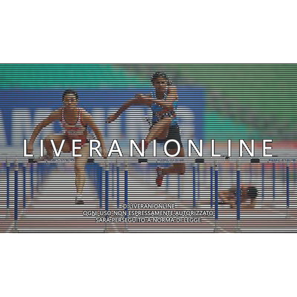 (101122) -- GUANGZHOU, Nov. 22, 2010 () -- India\'s Susmita Singharoy (C) and South Korea\'s Lee Eun Im compete (L) during the women\'s 100m hurdles of heptathlon of athletics at the 16th Asian Games in Guangzhou, south China\'s Guangdong Province, Nov. 22, 2010. (/Guo Dayue) ©photoshot/Agenzia Aldo Liverani Sas - ITALY ONLY - CINA: 16mi Giochi Asiatici